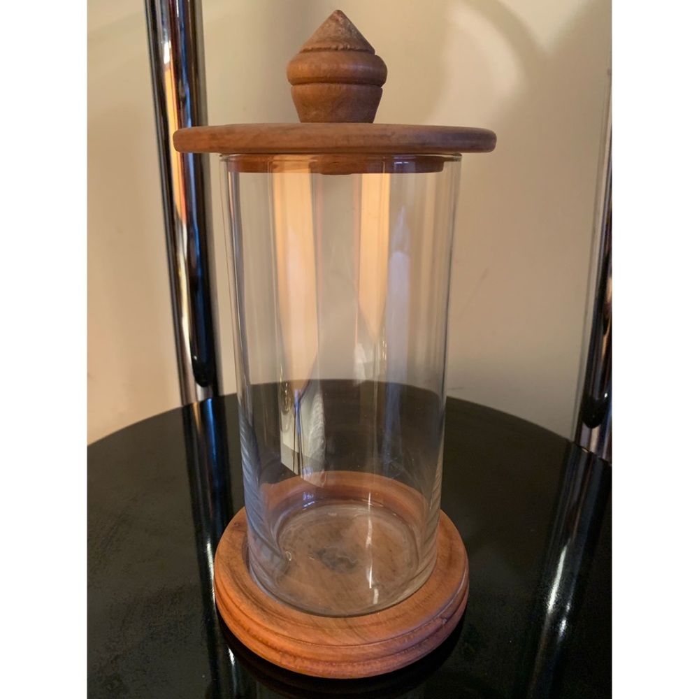 Glass jar with wooden lid and bottom